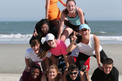 Scholars participate in the 2013 Super Weekend Beach Olympics.